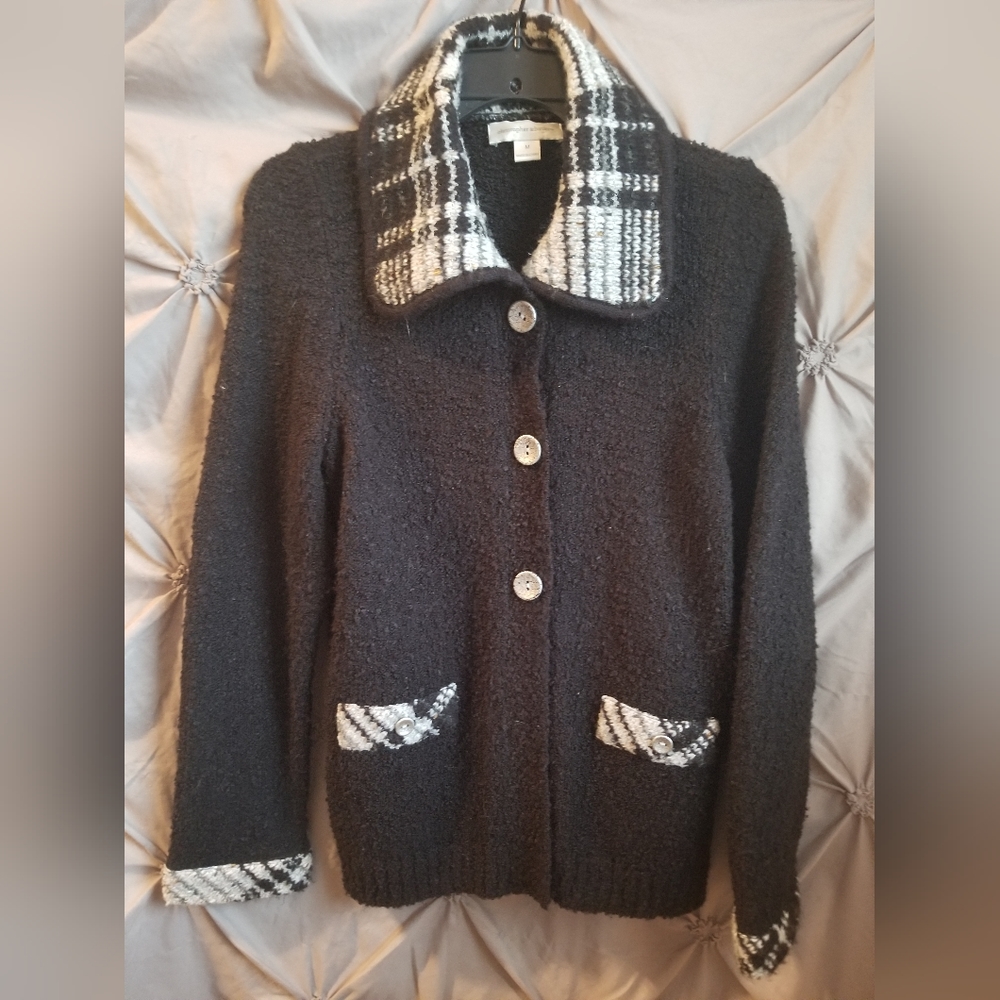 Christopher Banks, cardigan style sweater.